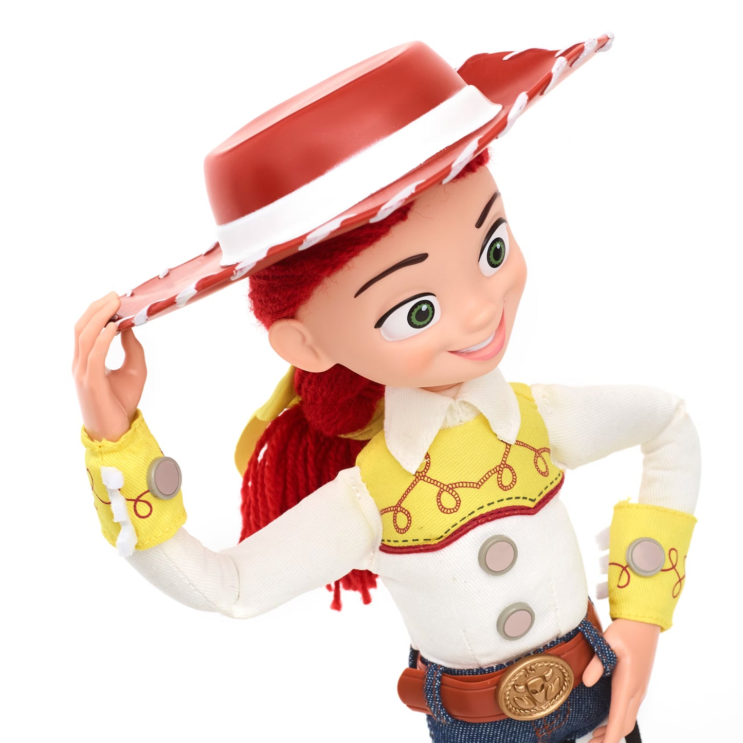 Toy figure of a character with a red hat and yellow vest on a white background